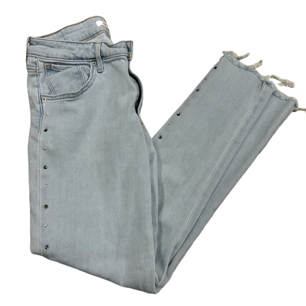 Levi’s embellished high rise light blue skinny jeans w/ distressed hem